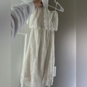 Strapless, white lace dress with open back. Worn once